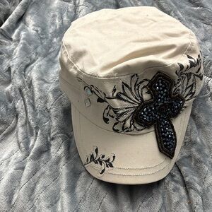 Embellished Cream Cap with Black Accents
